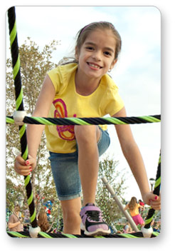 Girl climbing on neon lights rope