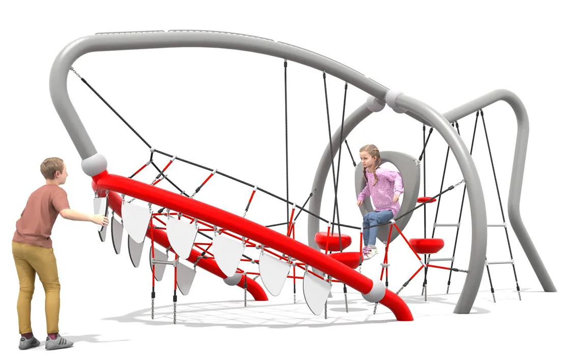 Children play on a shark-inspired playground with rope climbing elements, red supports, and white tooth shapes.