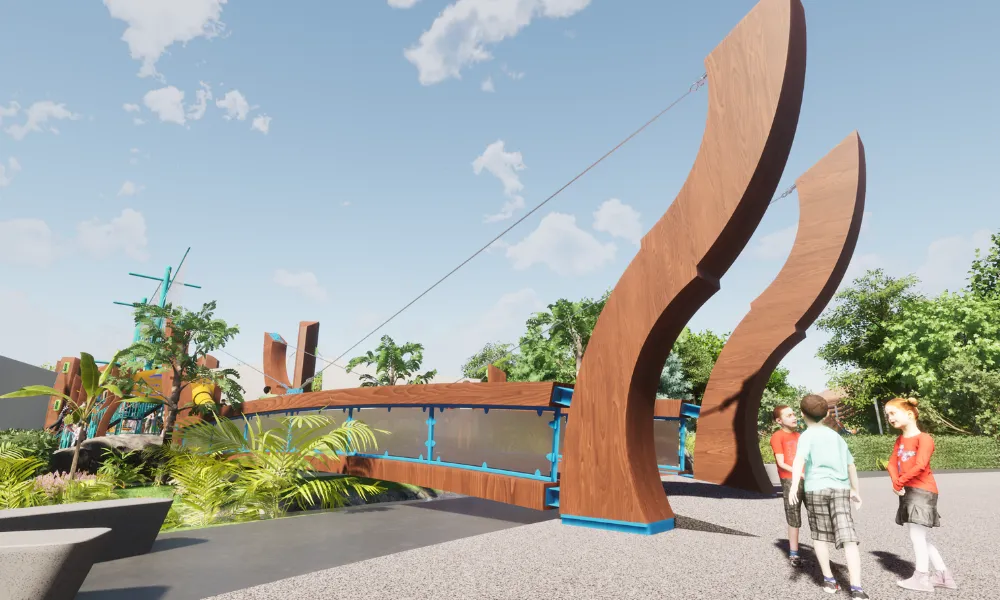 Children walk near a sculptural wooden bridge with curved supports, set within a lush playground environment.